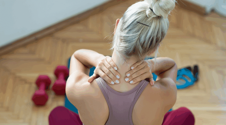 Woman rubbing her neck