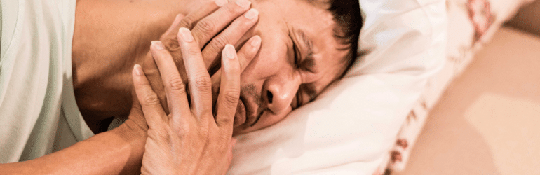 TMD and TMJ healthcare concept: Temporomandibular Joint and Muscle Disorder. Asia man hand on cheek face as suffering from facial pain, mumps or toothache