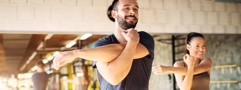 Couple warming up before exercise